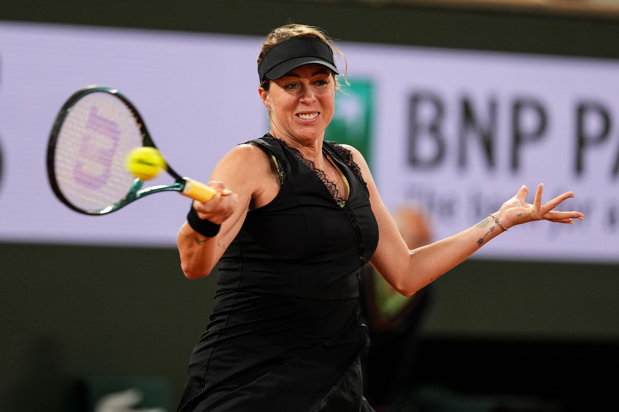 Anastasia Pavlyuchenkova plays a forehand in the Women's Singles First Round match against Zheng Qinwen of China on Day One of the 2025 French Open at Roland Garros